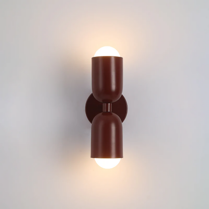 Decorative LED wall light with a vibrant double-sided glow, perfect for modern home interiors.