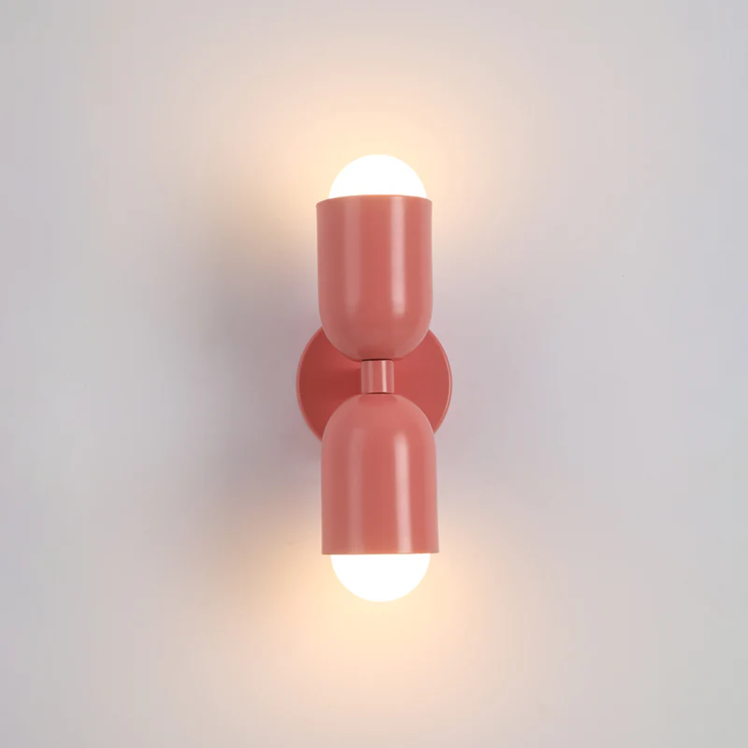 Contemporary double-sided LED wall fixture, colorful and stylish, enhances any modern home decor.