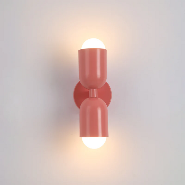 Contemporary double-sided LED wall fixture, colorful and stylish, enhances any modern home decor.