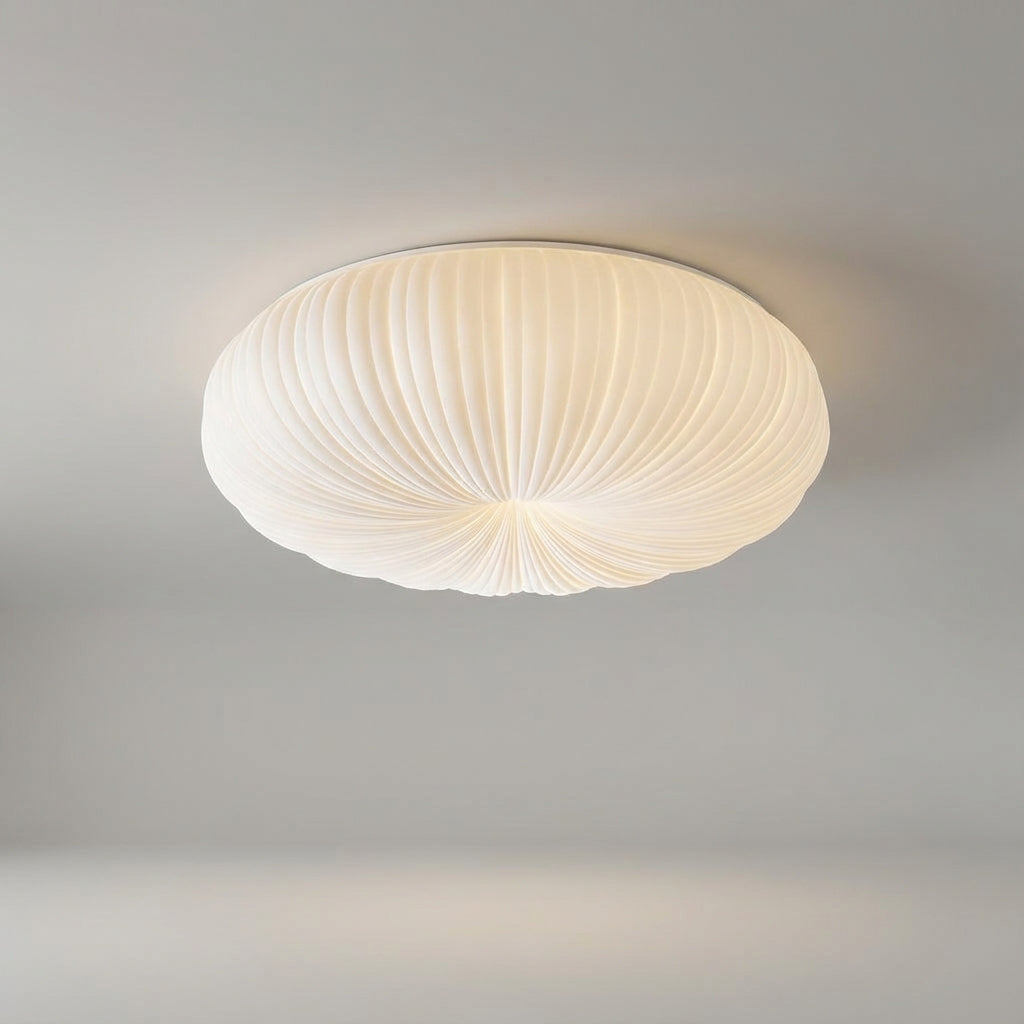 Modern flush mount LED ceiling light, Ciravine, for elegant home decor. Creates a gentle, ambient glow.