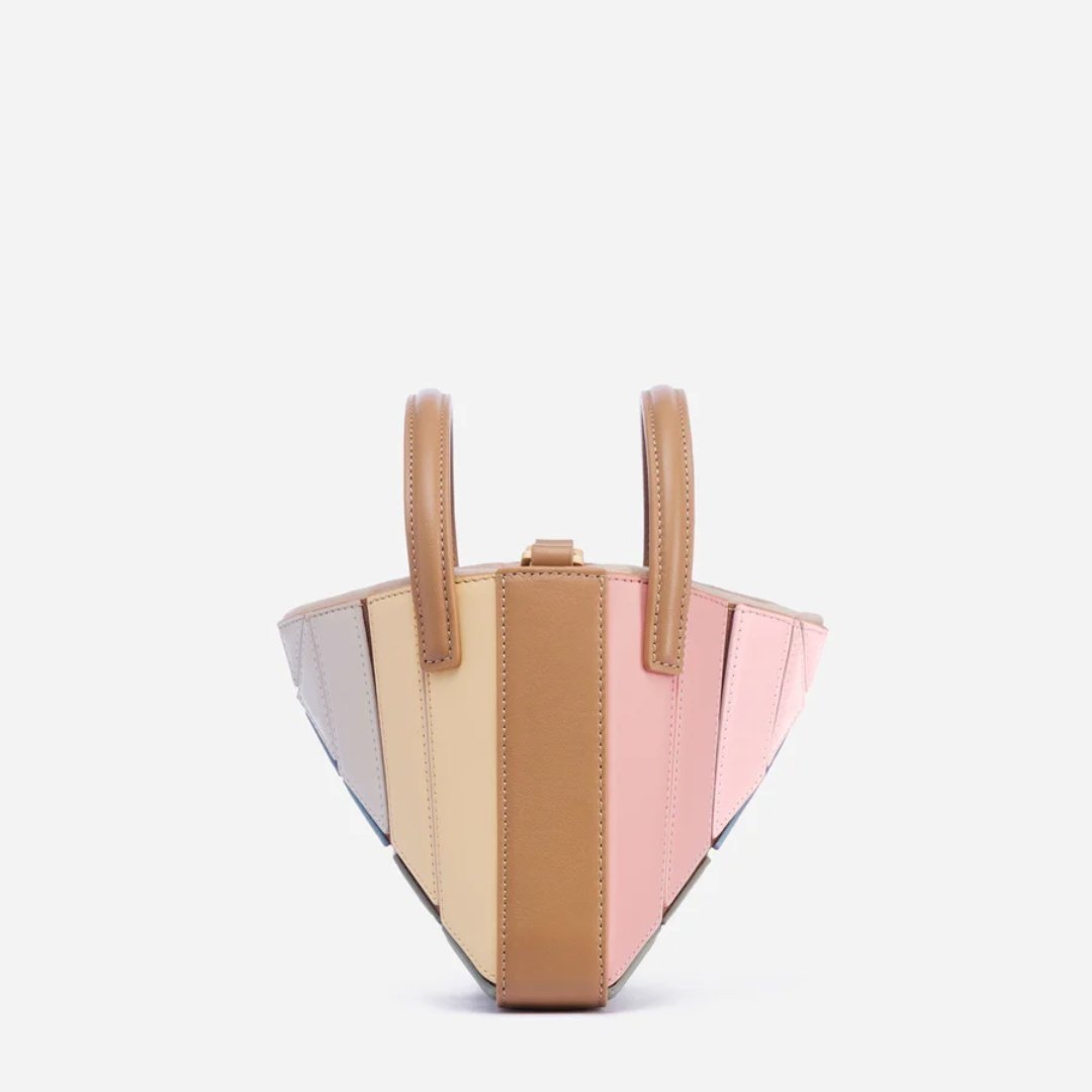 Abstract geometric design women's shoulder bag. Modern purse, a unique and colorful fashion accessory.