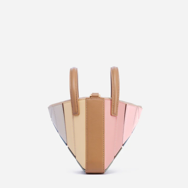 Abstract geometric design women's shoulder bag. Modern purse, a unique and colorful fashion accessory.