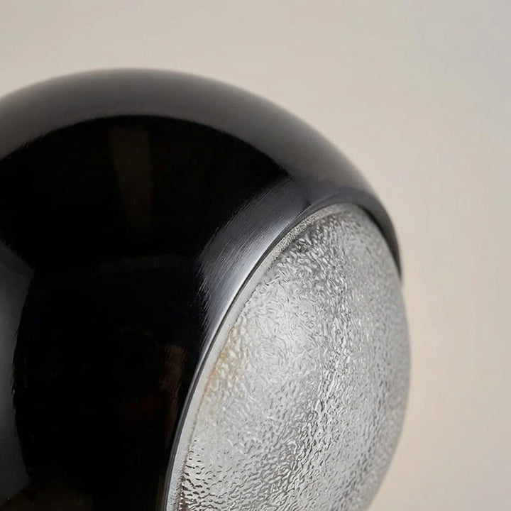 Adjustable modern wall sconce, Glintara LED fixture creating warm ambient light. Perfect for contemporary interiors.