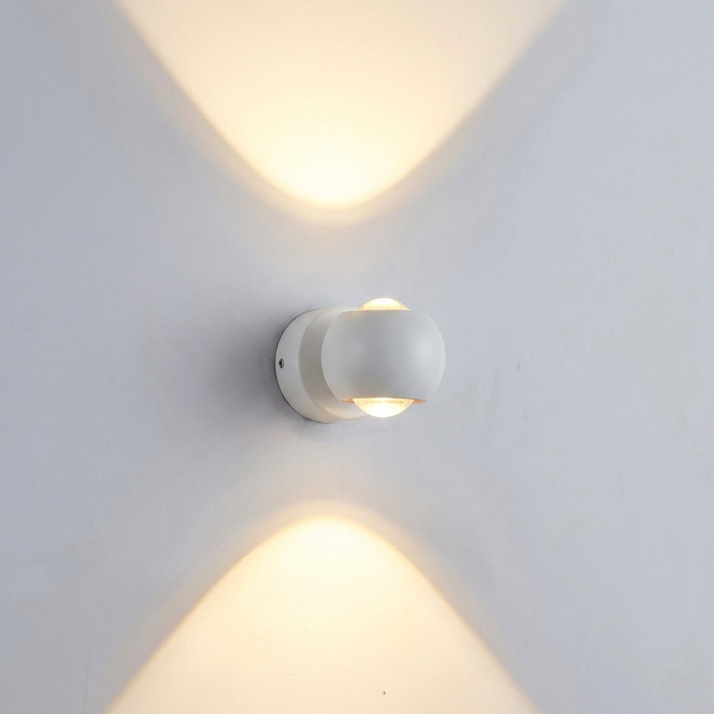 Contemporary Glintara wall lamp, adjustable modern LED fixture for indoor ambient lighting in a stylish setting.
