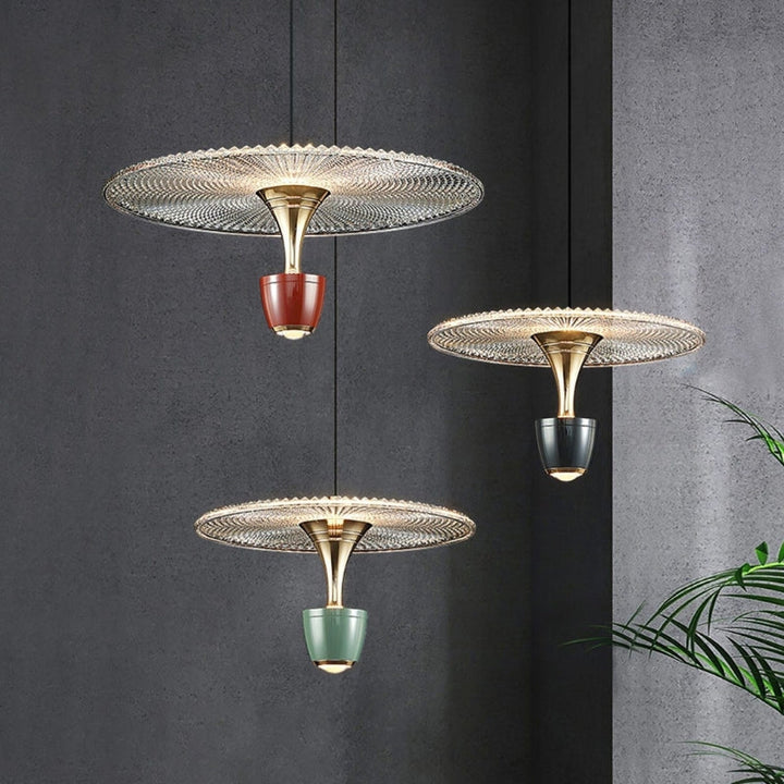 Green Glissara sleek modern pendant light. Contemporary hanging lamp for dining room and home decor.