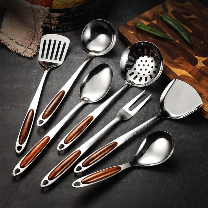 Ergonomic cooking utensil set. Rust-resistant and dishwasher safe kitchen tools for precise, comfortable cooking.