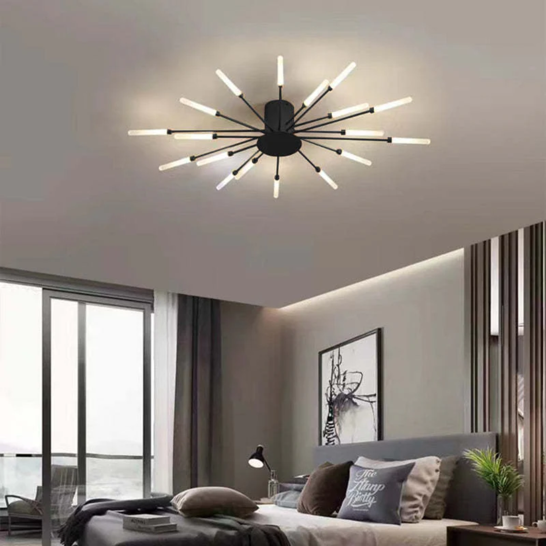 Contemporary gold LED ceiling light, brightens large living rooms.