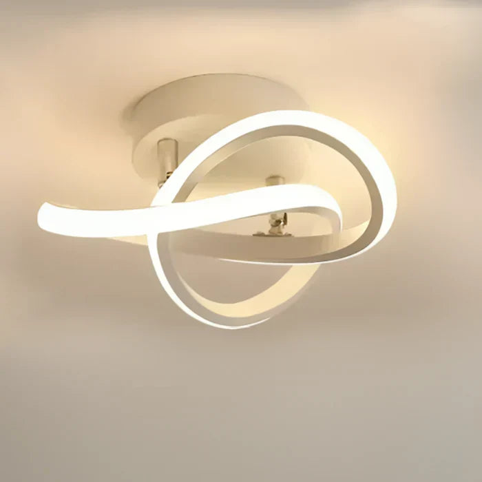 Chic LED ceiling lamp with Twilight Rings, modern dual ring design for contemporary indoor lighting.
