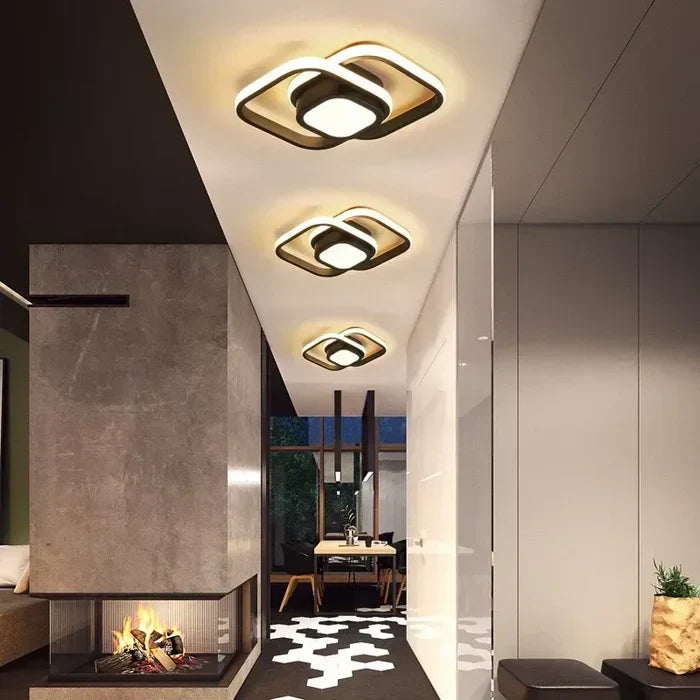Elegant dual ring LED ceiling light, Twilight Rings collection, providing warm white modern lighting.