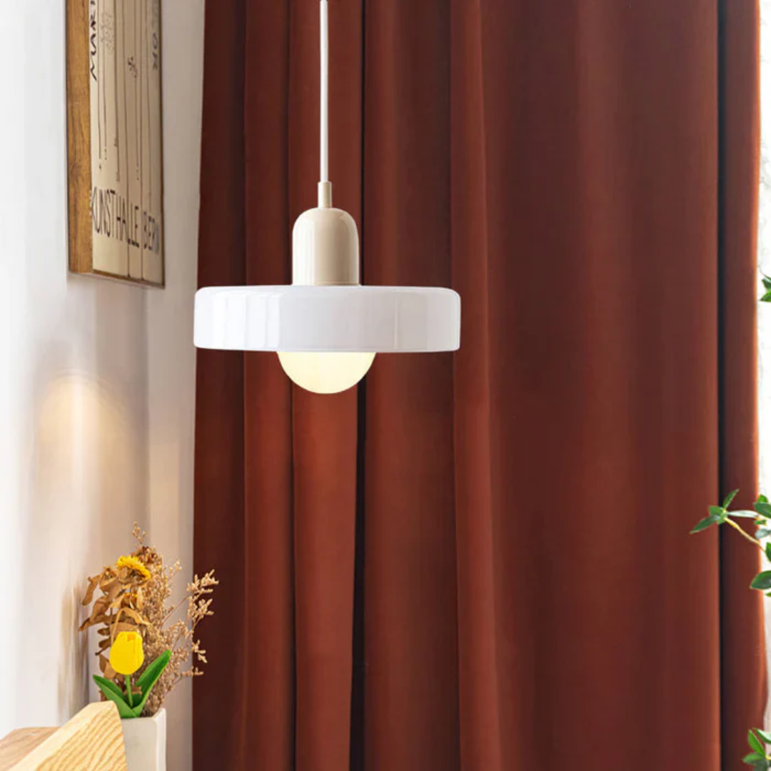 Modern ceiling light with LED glass globe, ideal for dining areas.