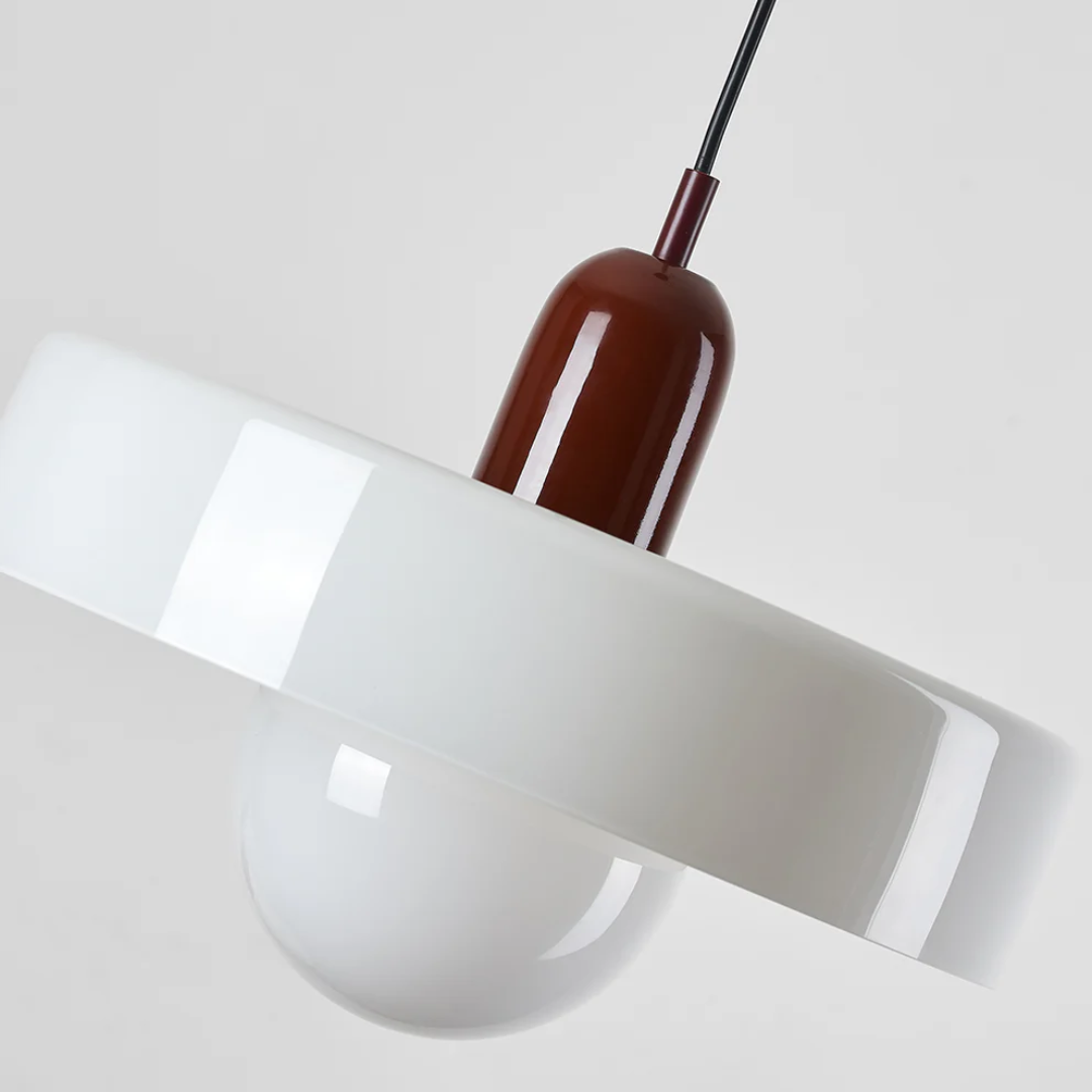Modern glass globe pendant light, perfect for ambient bedroom lighting.