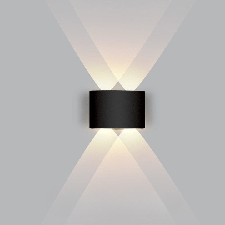 Weatherproof LED wall fixture, modern design for garden & patio illumination.