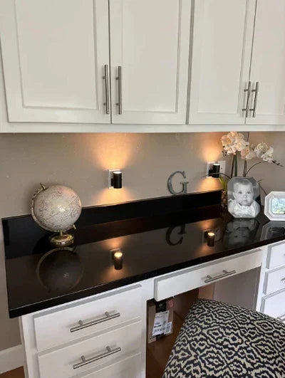 Decorative LED wall lamp providing warm white ambient lighting. Built-in dusk sensor ensures automatic, energy-efficient illumination.