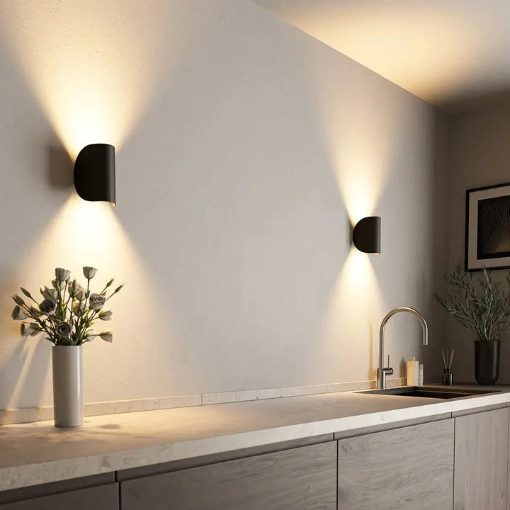 Modern LED wall light for living room. Sleek, energy-efficient interior lighting with minimalist design.
