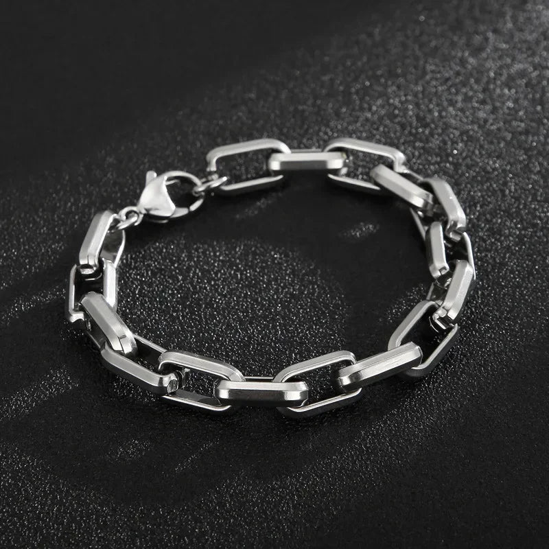 Sleek stainless steel chain bracelet for men, featuring modern rectangular links and a polished finish. Great gift.