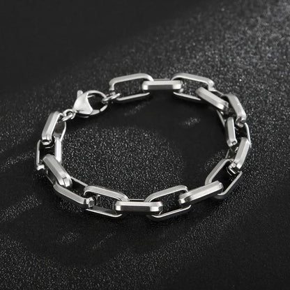 Sleek stainless steel chain bracelet for men, featuring modern rectangular links and a polished finish. Great gift.