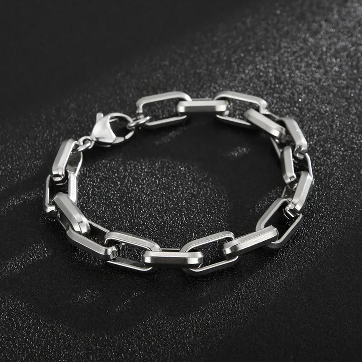 Sleek stainless steel chain bracelet for men, featuring modern rectangular links and a polished finish. Great gift.