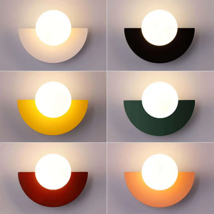 Elegant half moon metal wall light with integrated LED, perfect modern home accent.