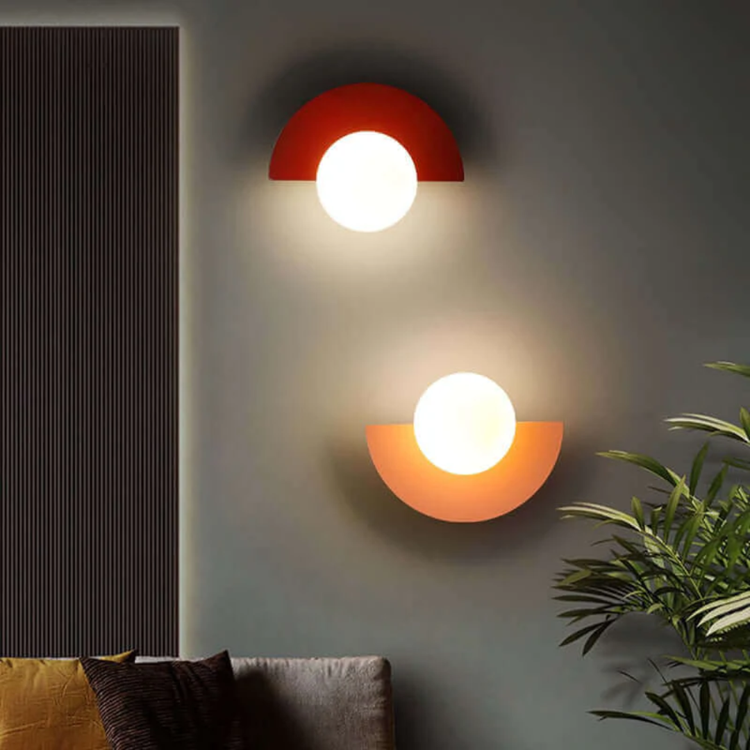 Contemporary half moon wall fixture, modern metal lamp enhances any room's decor.