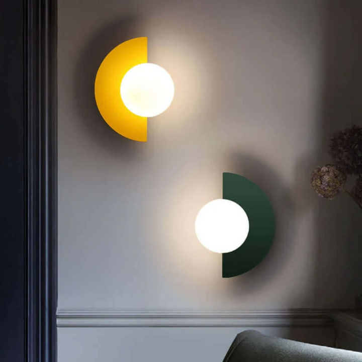 Dimmable LED half moon wall lamp, stylish metal design for versatile interior lighting.