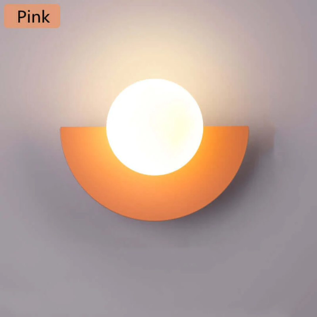 Sleek modern half moon LED wall light, ideal for minimalist metal home decor.