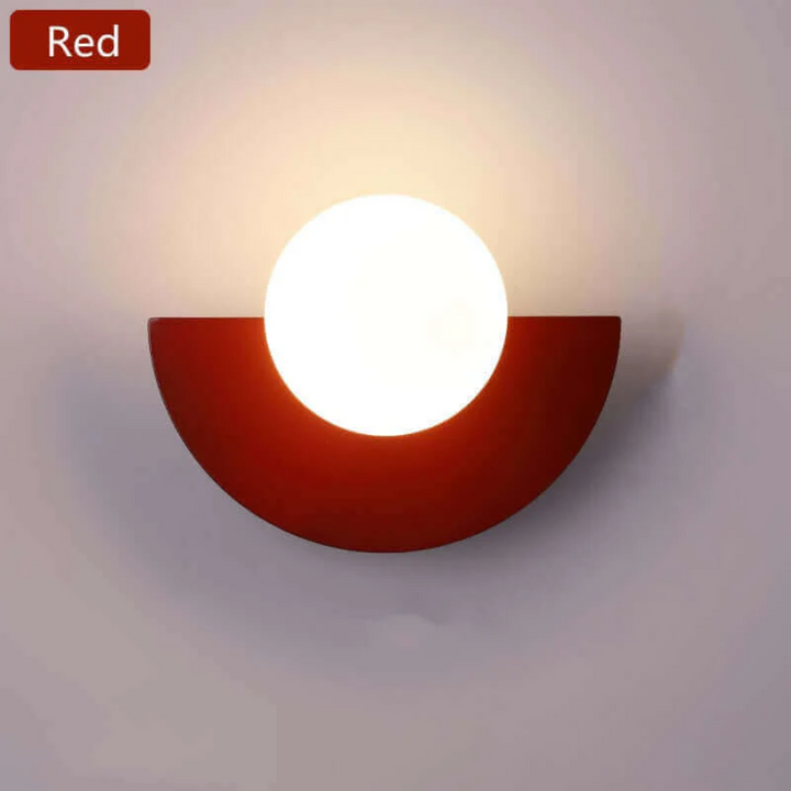 Soft glow from modern half moon LED wall lamp, elegant metal design for ambient lighting.