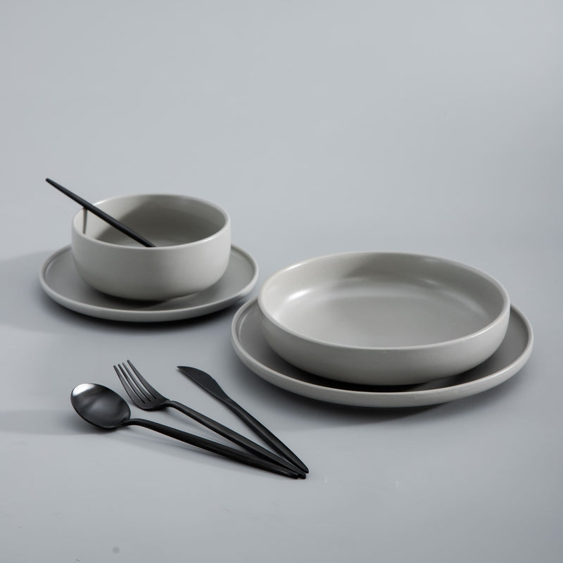 Modern matte gold flatware set for elegant dining, enhancing kitchen aesthetic.