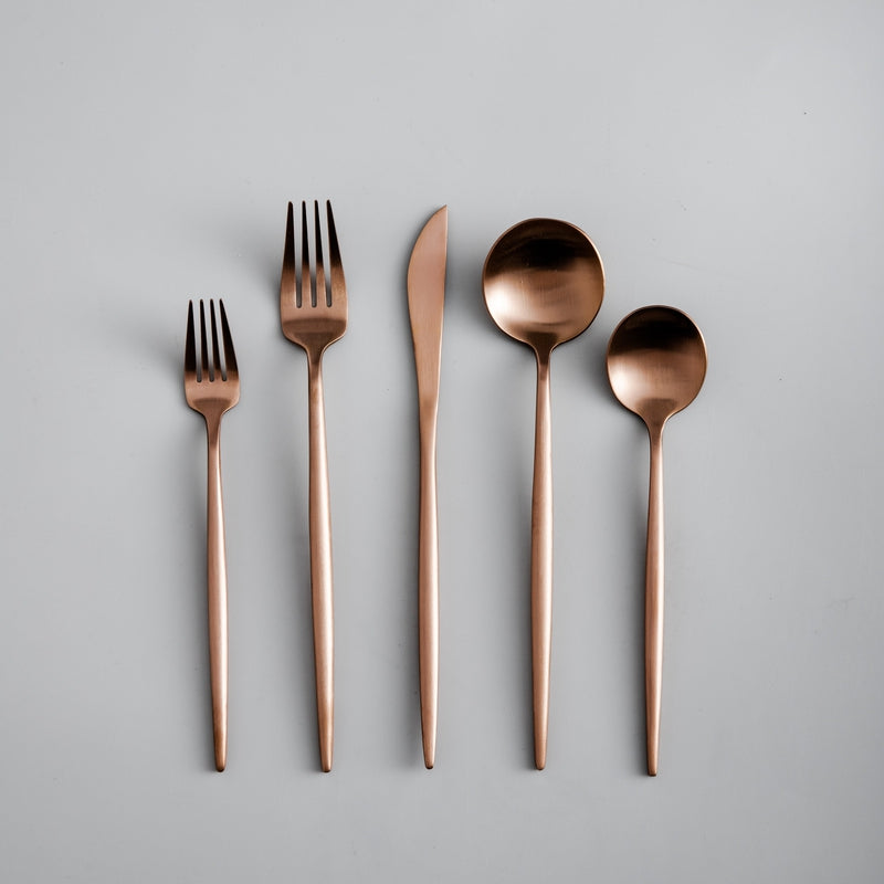 Matte silver minimalist flatware set, ideal for contemporary kitchen and dining.