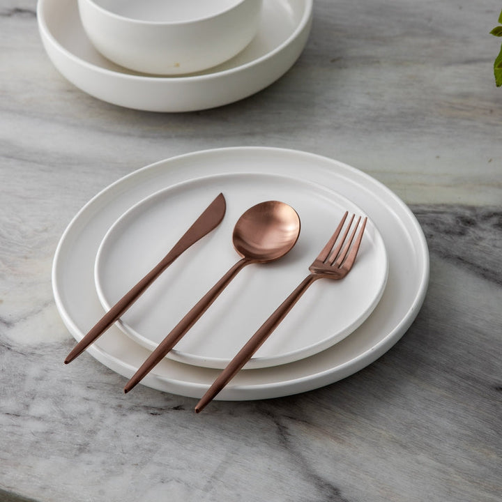 Designer matte gold flatware set, bringing modern elegance to your dinnerware.