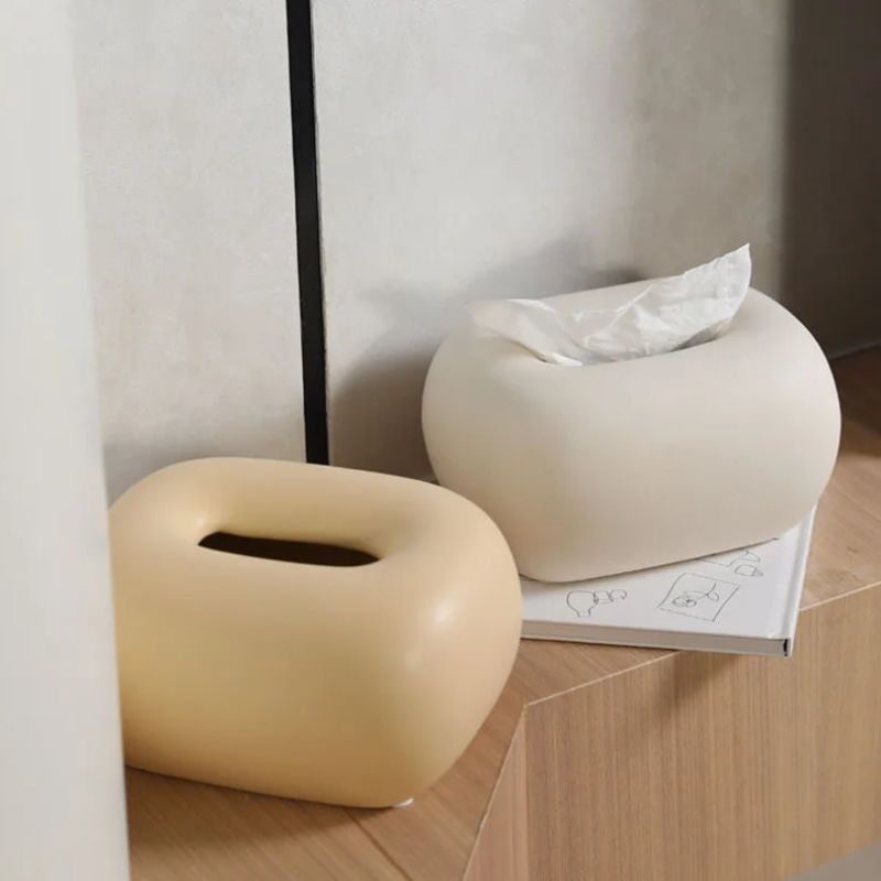 Modern neutral ceramic tissue box cover, a stylish home decor accent for any room.