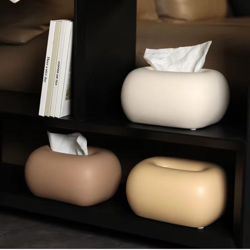 Stylish modern ceramic tissue box cover in a living room setting, enhancing decor & organization.