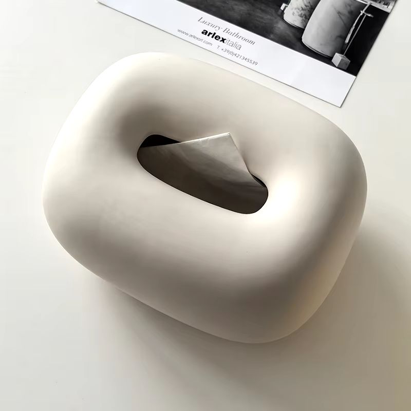 Contemporary ceramic tissue box cover on an office desk, adding modern style & organization to workspaces.