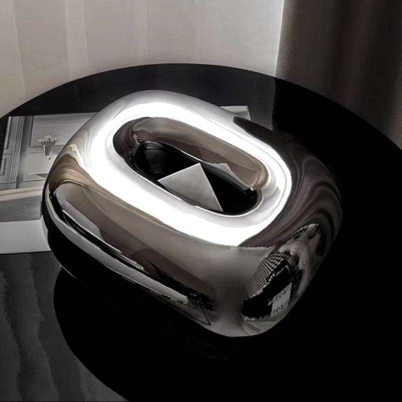 Decorative ceramic tissue dispenser, a modern and neutral organization solution for stylish home living.