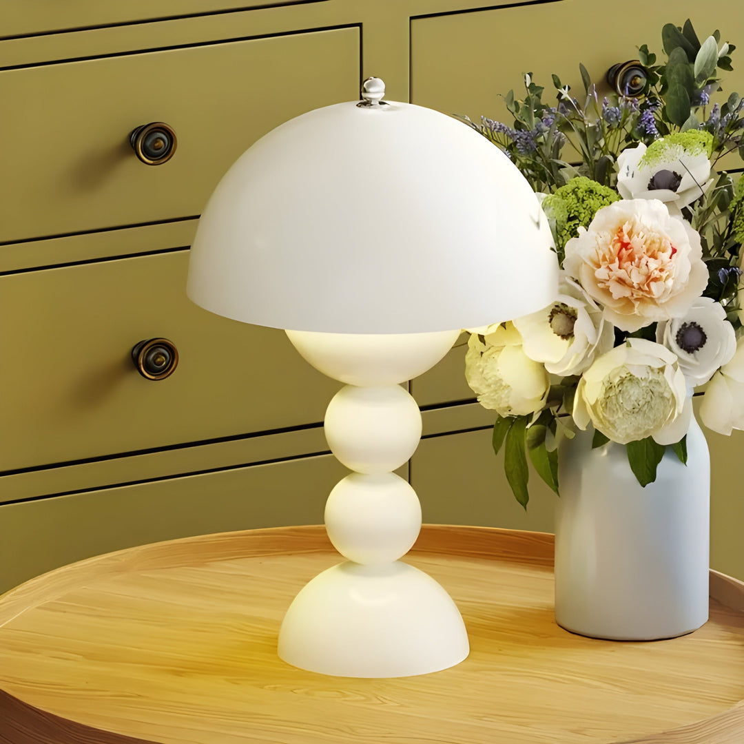 Modern dimmable LED bedside table lamp, flower bud aesthetic, soothing light.