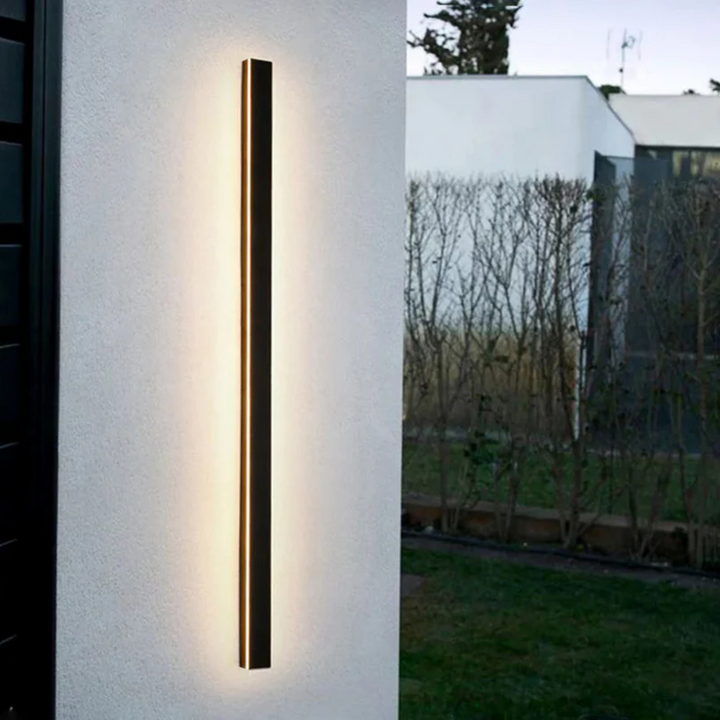 Energy efficient LineaGlow LED wall lamp, ideal for modern garden and path lighting.