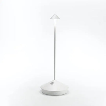 Portable LED table lamp, dimmable, wireless & rechargeable for versatile home decor.