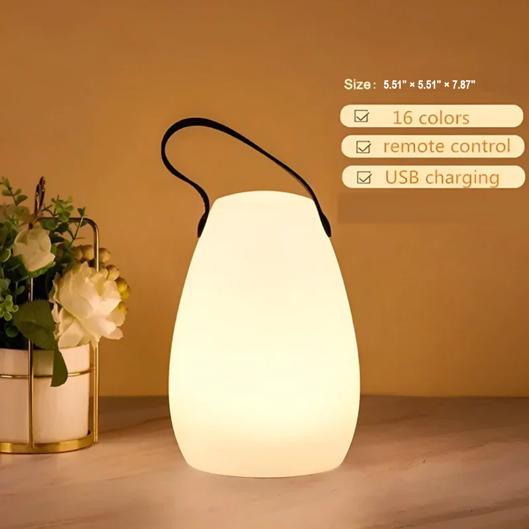 Ambient portable LED table lamp, waterproof & wireless, designed for indoor/outdoor modern spaces.