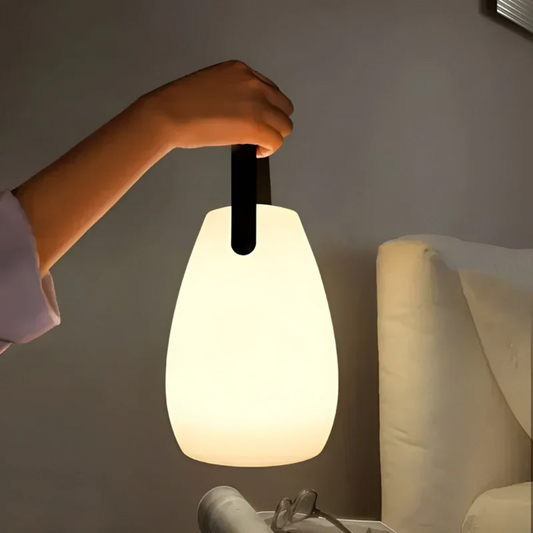 Modern portable waterproof wireless LED table lamp, perfect for indoor & outdoor accent lighting.