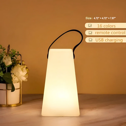 Stylish modern accent LED table lamp, waterproof, wireless & portable for indoor & outdoor spaces.