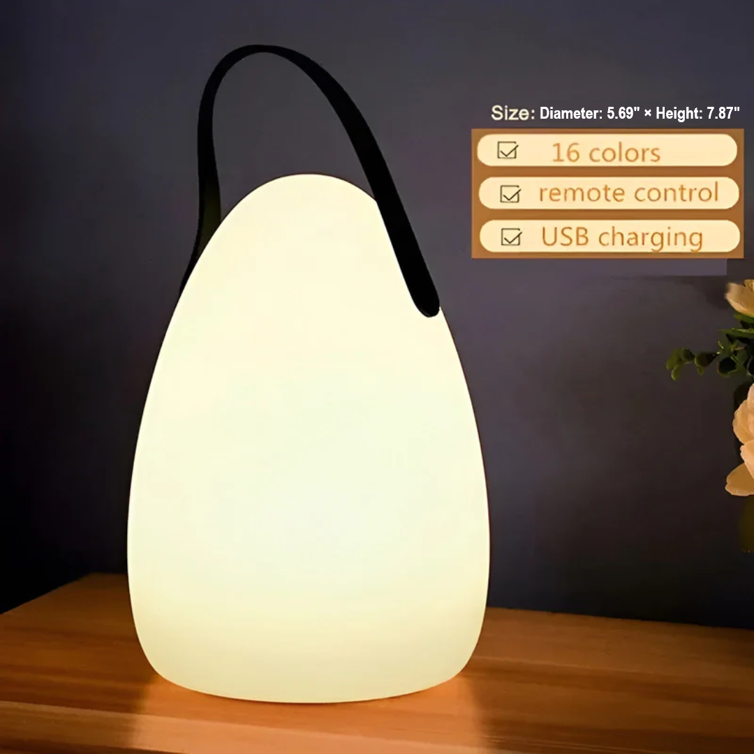 Versatile portable wireless LED table lamp, waterproof for indoor ambiance or outdoor illumination.