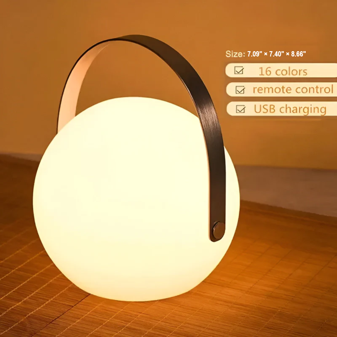 Modern USB rechargeable LED table lamp, wireless & waterproof for home or garden accent lighting.