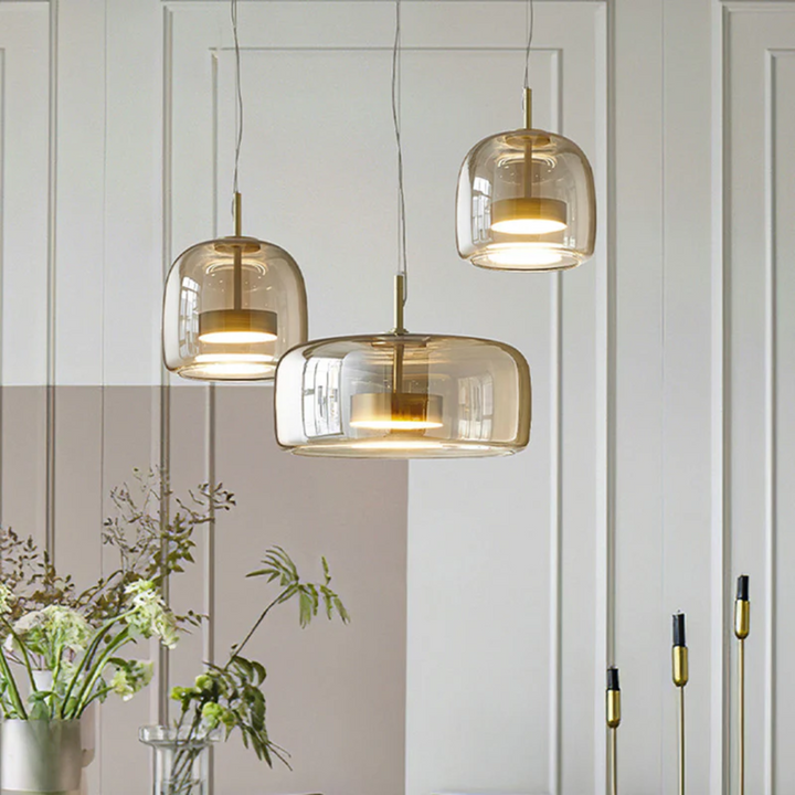 Retro industrial LED pendant light, black metal and clear glass, for a modern interior.