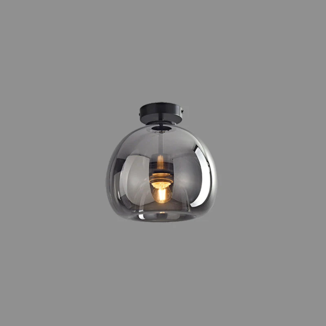 Stylish black round LED ceiling lamp, "Aurelia", providing modern and energy-efficient lighting.