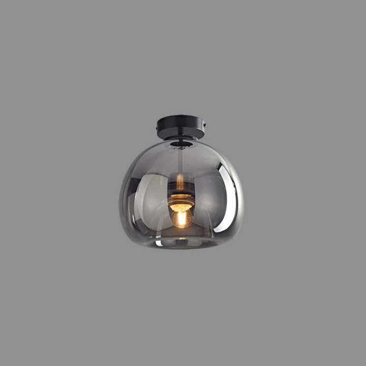 Stylish black round LED ceiling lamp, "Aurelia", providing modern and energy-efficient lighting.
