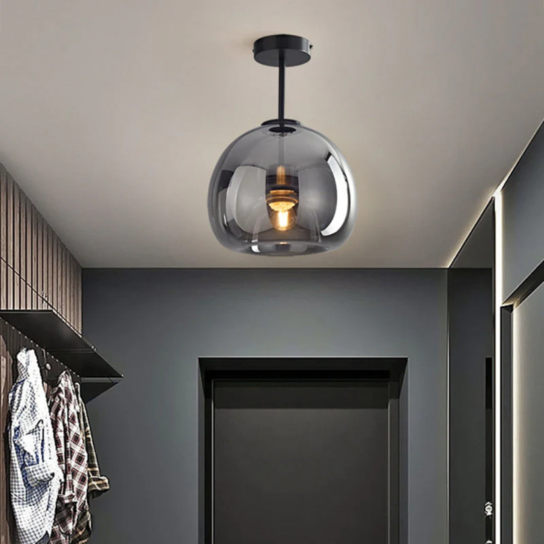 Elegant gold round LED ceiling light "Aurelia" for a sophisticated living room ambiance.