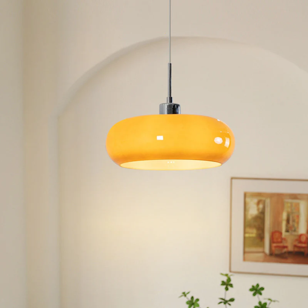 Modern round LED pendant light for stylish home decor, offering warm white adjustable lighting.