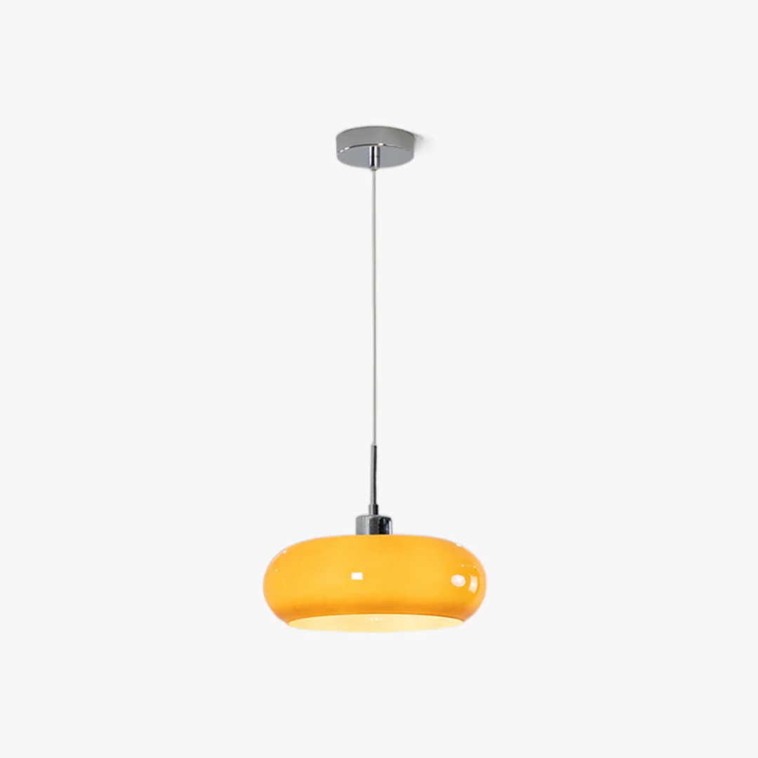 Sleek round LED pendant light, providing decorative warm white lighting for any modern interior.