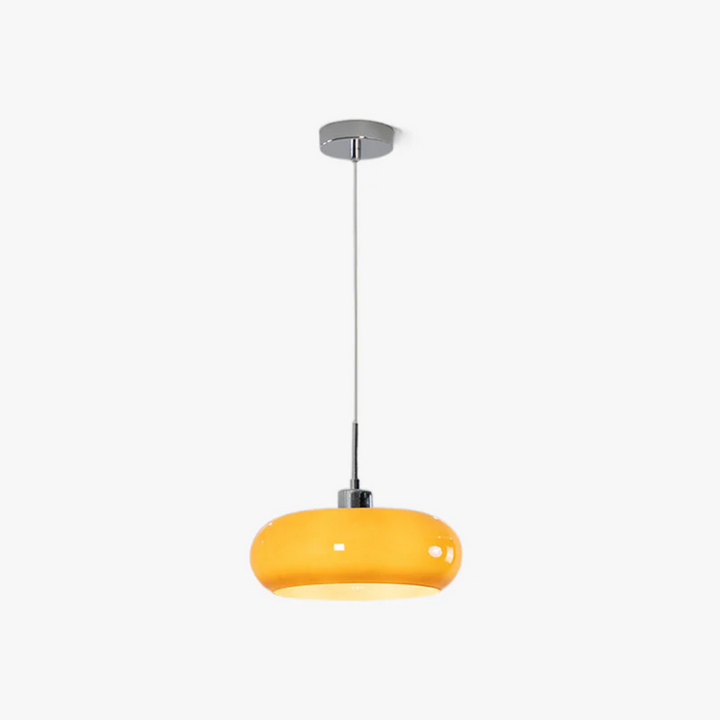 Sleek round LED pendant light, providing decorative warm white lighting for any modern interior.
