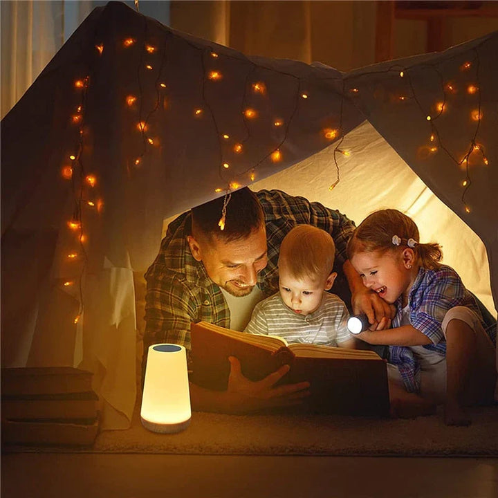 Color-changing LED night light with magical touch control. USB rechargeable, creates a soothing ambient glow.