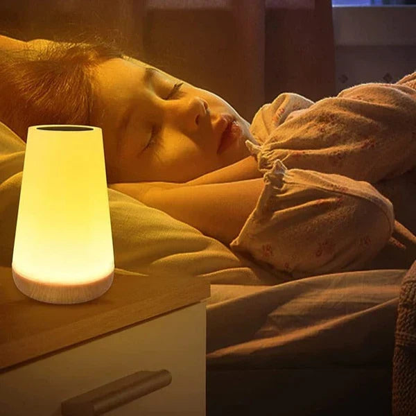 Elegant modern bedside lamp. Touch control, color changing LED for ambient lighting and a relaxing mood.